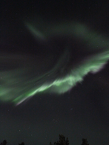 Burst of northern lights over Lapland