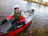 Canoeing on a river in Enontekiö