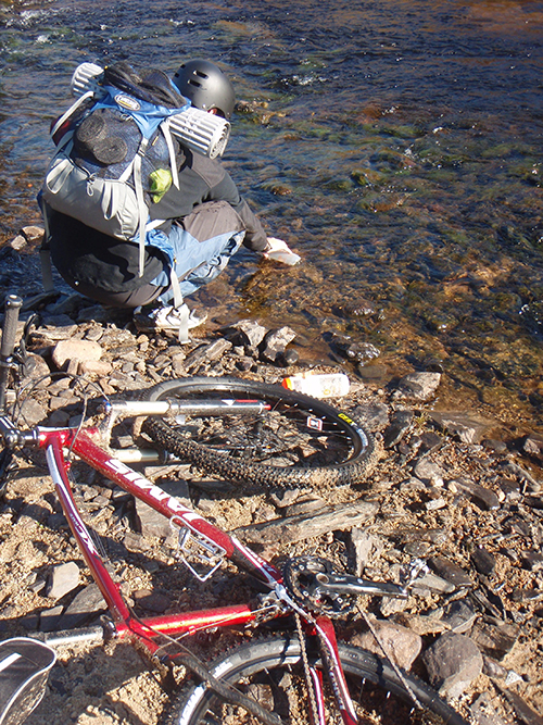 Mountain biker on an unmarked wilderness trail