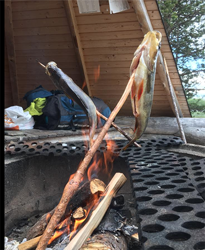 Preparing fish during the bushcraft course