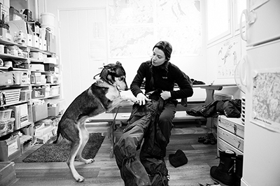 A guide caring for a husky