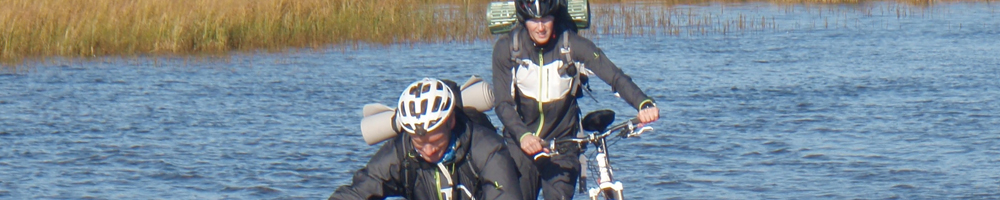 Cyclist on a cross-border wilderness trail