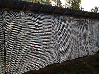 Bird netting over the sleigh shelter to protect the sleds