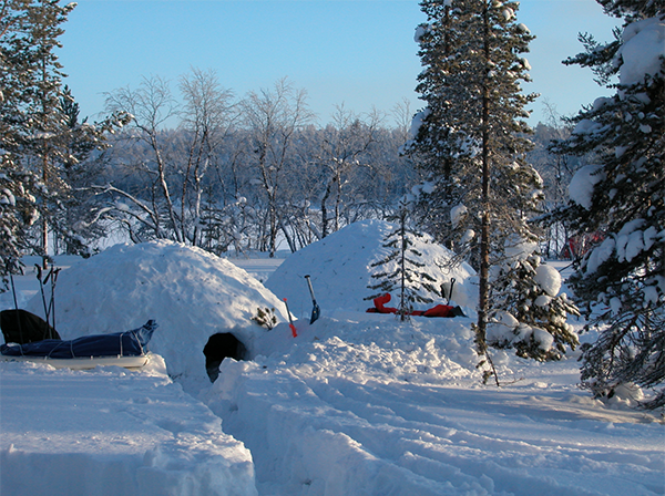 Snow shelters built on a survival course