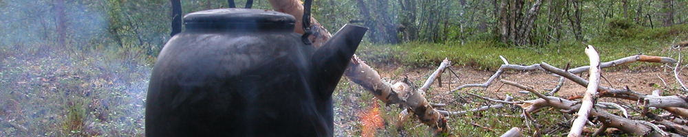 Outdoor campfire at a wilderness hut near Hetta