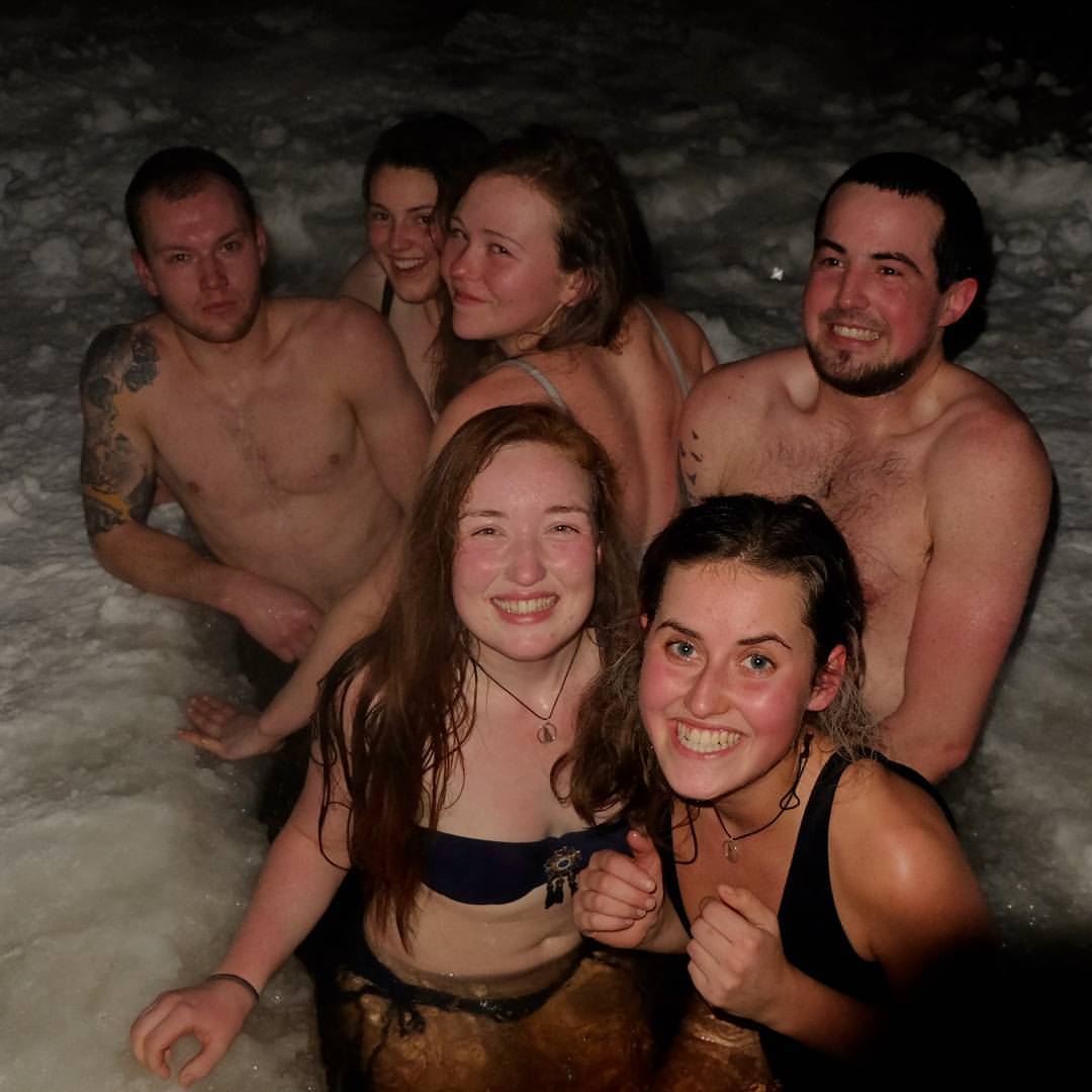 A private ice hole cut into a frozen lake for swimming